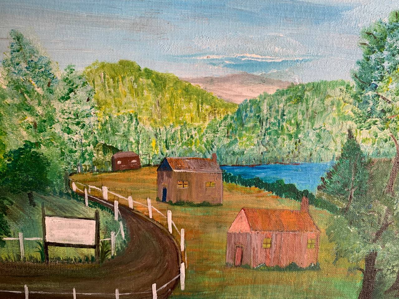 Landscape with houses, path, and lake