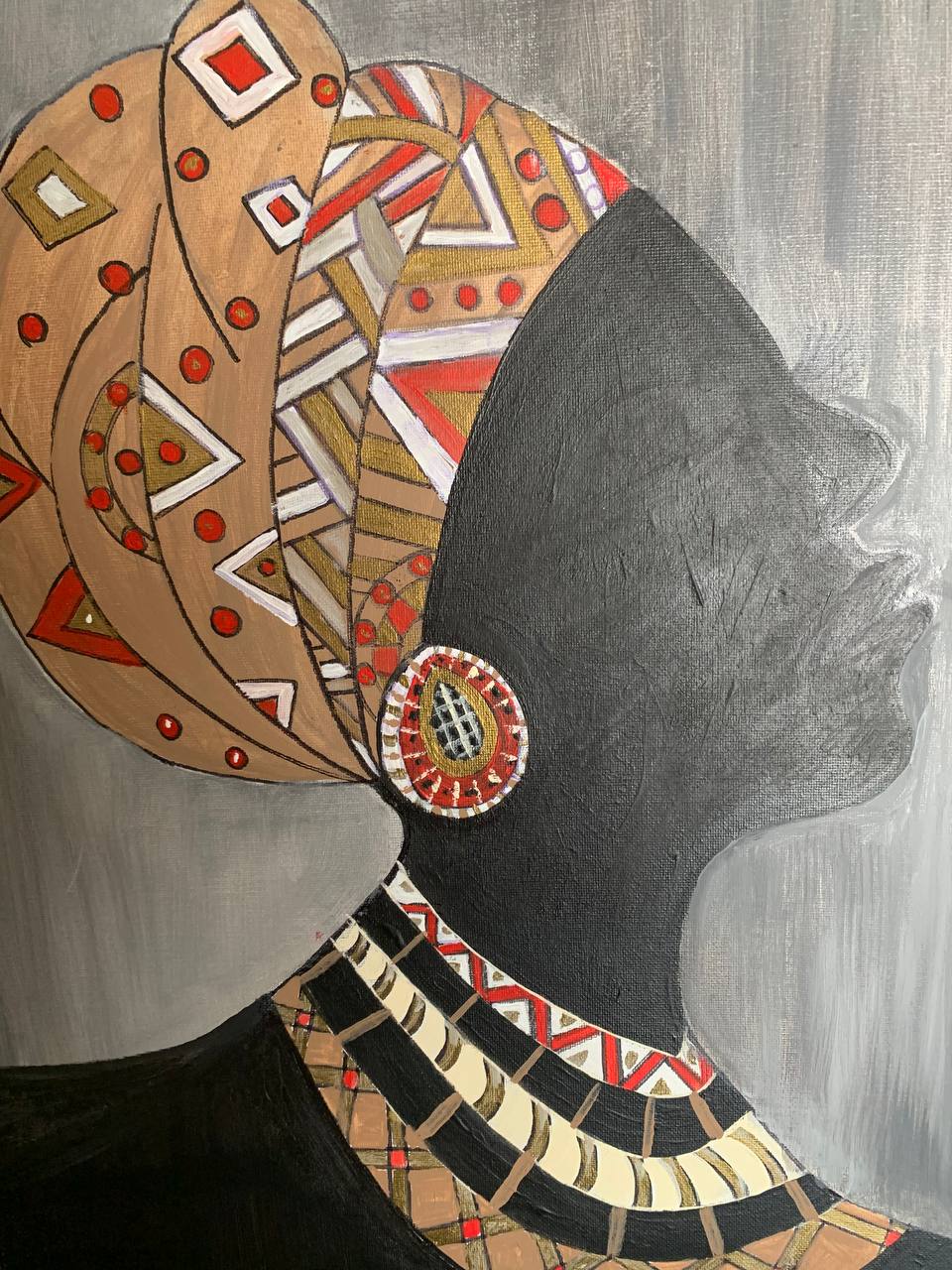Profile portrait with headwrap and jewelry