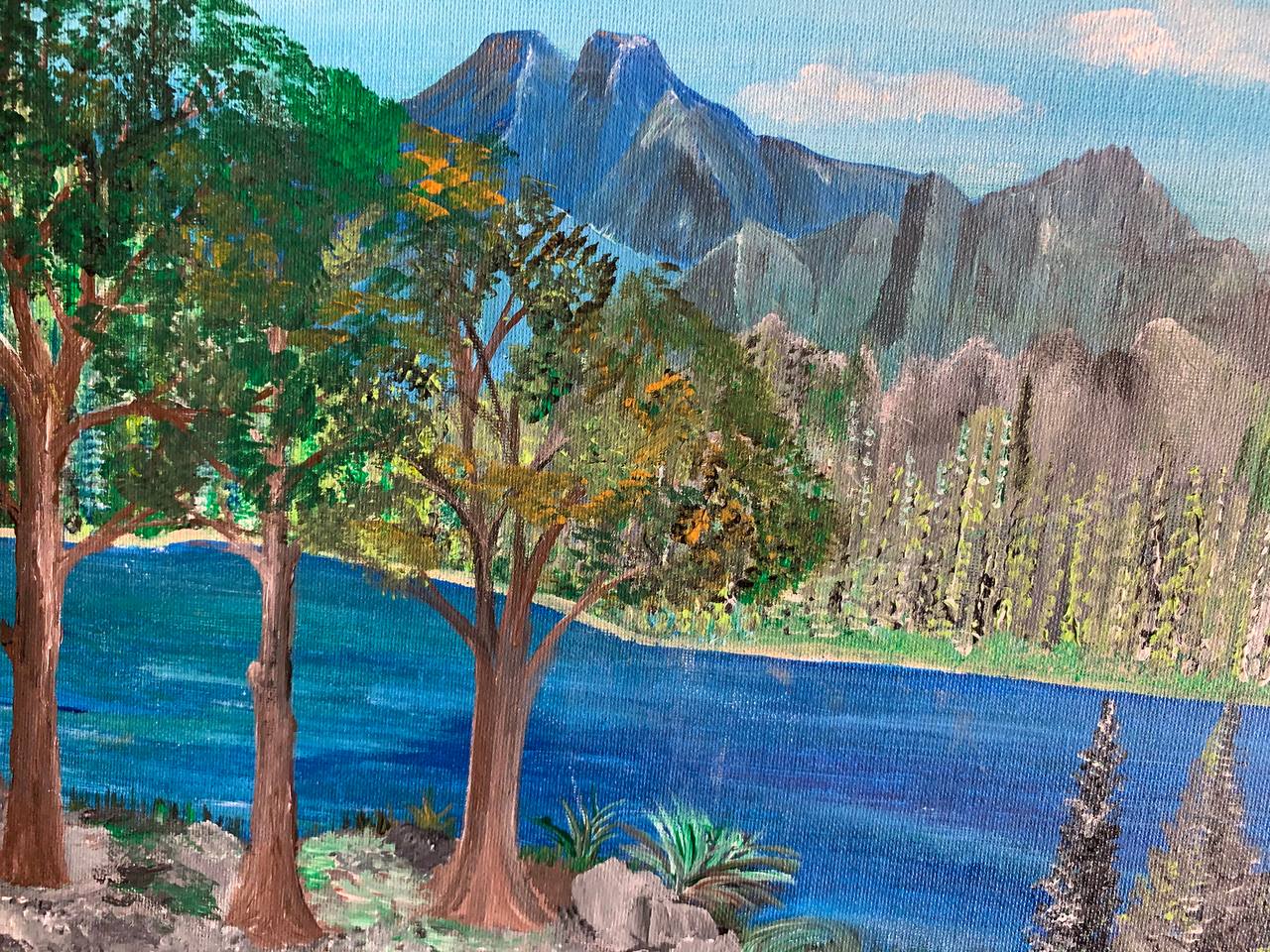 Mountain lake and cabin landscape