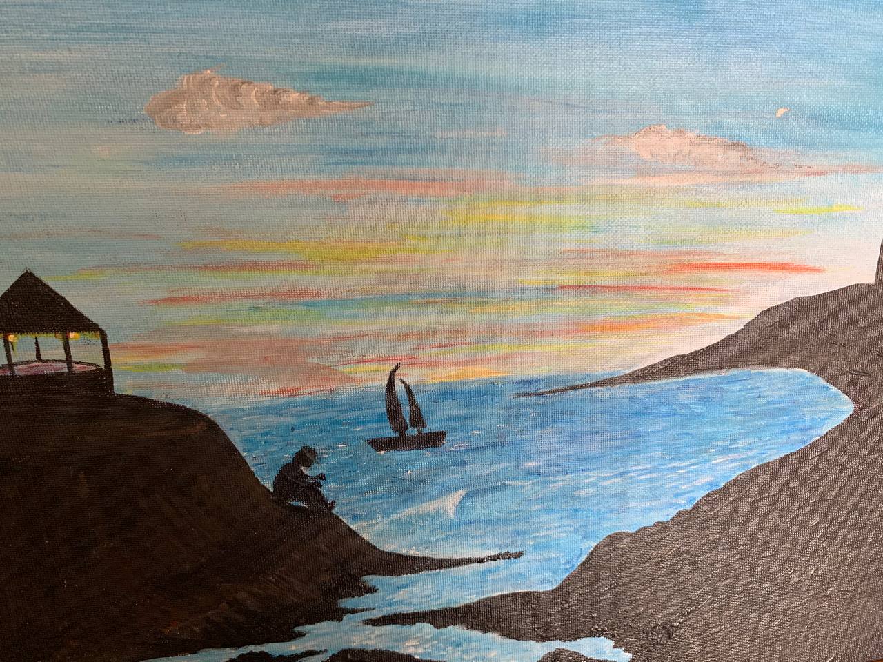 Evening inlet with sailboat