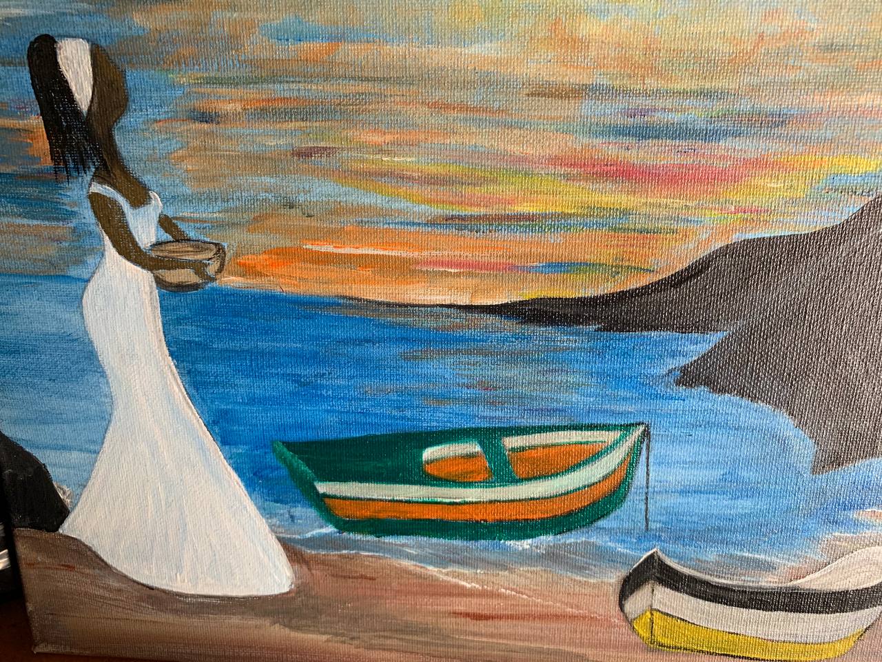 Woman in white by the shoreline